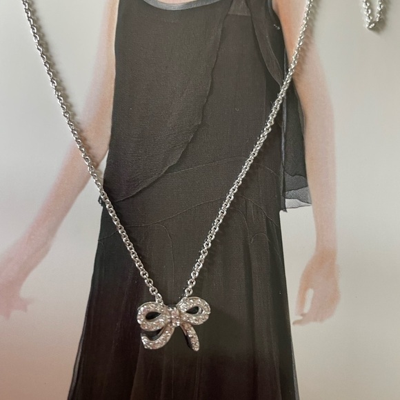 N/A Jewelry - New - Silver tone Petite bow necklace